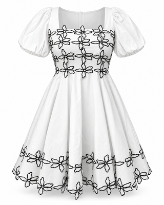 A white short puff-sleeve dress with black floral embroidery, featuring a square neckline and a flared skirt.